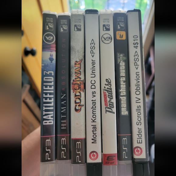Sony PlayStation 3 Console with Black Controller and 7 games